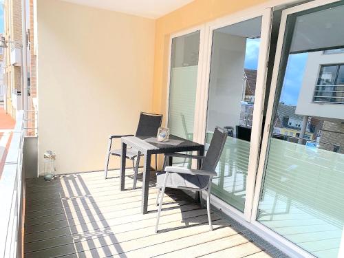 Μπαλκόνι ή βεράντα στο Ferienwohnung Freyja Hafenspitze Eckernförde