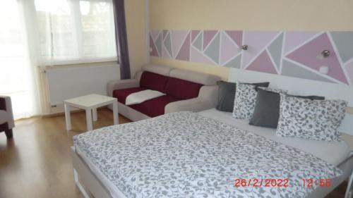Postel nebo postele na pokoji v ubytování Gästehaus Stein