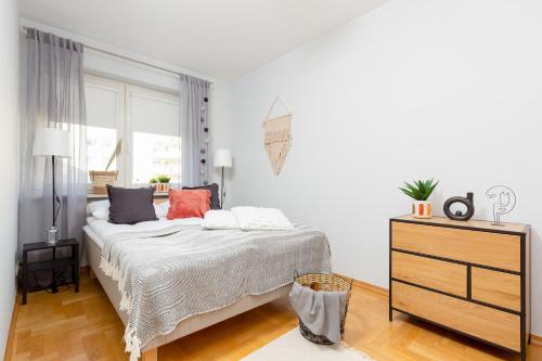 Posteľ alebo postele v izbe v ubytovaní Mokotów Apartment Bluszczańska by Noclegi Renters