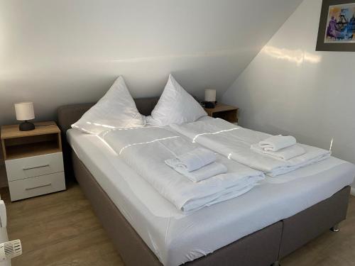 En eller flere senge i et værelse på Ladigo 14