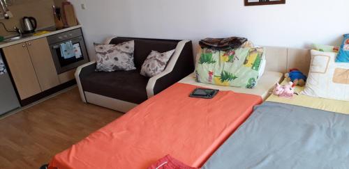 A bed or beds in a room at studio by the Pool in Aspen Heights Bansko