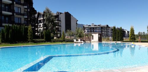 The swimming pool at or close to studio by the Pool in Aspen Heights Bansko