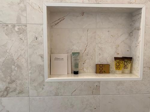 a shelf in a bathroom with boxes on it at Malibu Private Beach Apartments in Malibu