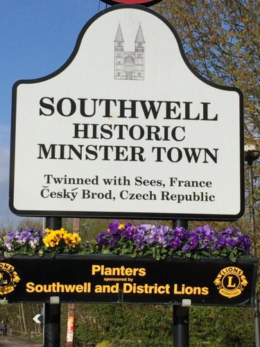 a sign for the southern historic minster town at Southwell Retreat Glamping Pods in Southwell