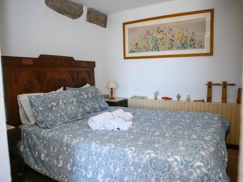 Postel nebo postele na pokoji v ubytování Casa de São João das Castanheiras