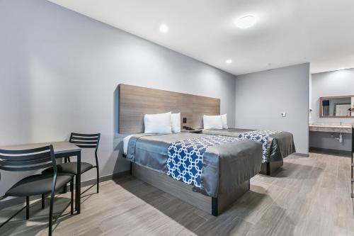 Ένα ή περισσότερα κρεβάτια σε δωμάτιο στο El Delfín Lodge