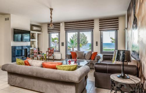Χώρος καθιστικού στο Villa Alexandros