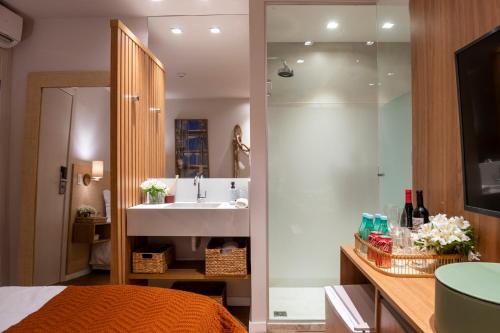 Ванная комната в Canto Hotel