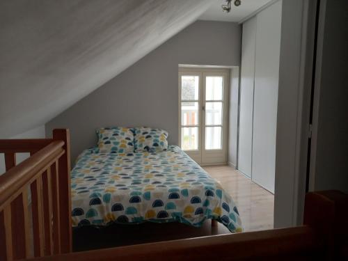 Postel nebo postele na pokoji v ubytování Insolite duplex