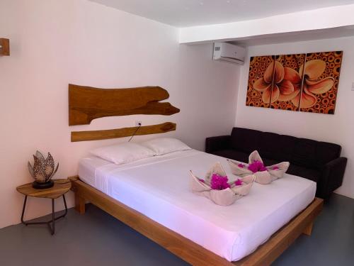Llit o llits en una habitació de Beach Front Bahia
