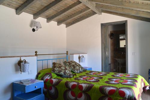 Säng eller sängar i ett rum på Barranco do Zambujeiro