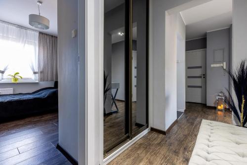 Posteľ alebo postele v izbe v ubytovaní Apartament SunForYou 2
