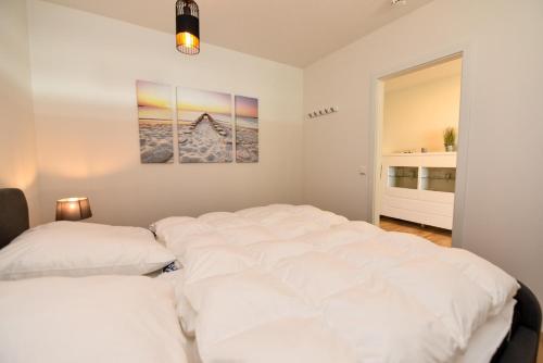 Postel nebo postele na pokoji v ubytování Haus "Panorama" Appartement PAN086