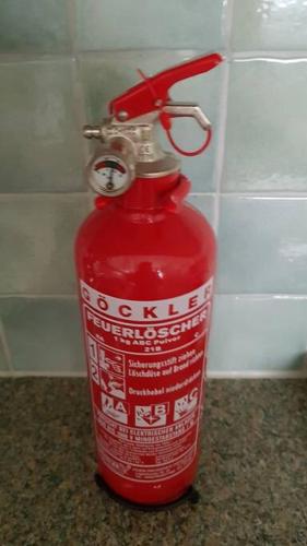 a red fire hydrant is sitting on a counter at Wohnung in Zentrumsnähe beim Hauptbahnhof (100 m2) in Vienna