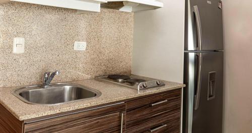 Nhà bếp/bếp nhỏ tại Riverfront I 1, piso 4, suite vista al rio, Puerto Santa Ana, Guayaquil