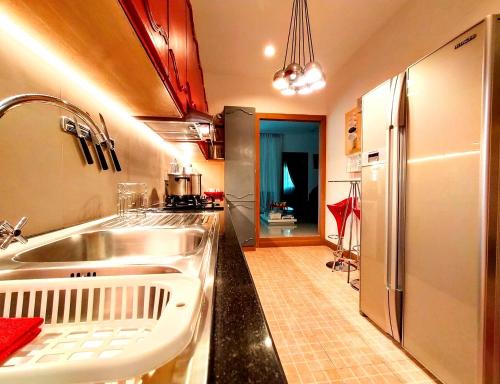 A kitchen or kitchenette at Leelawadee Pool Villa BBQ&Pool party