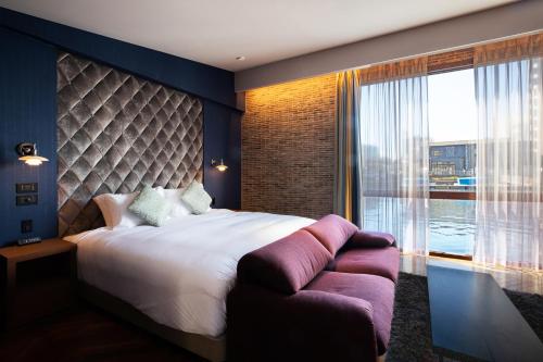 Ένα ή περισσότερα κρεβάτια σε δωμάτιο στο PETALS TOKYO - Floating Hotel