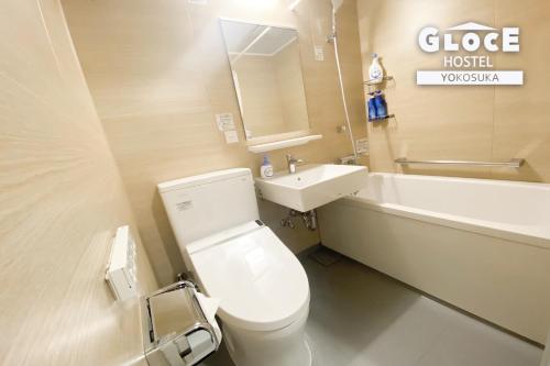 Um banheiro em GLOCE 横須賀 シェアルーム NAVY BASE l Yokosuka Share room at NAVY BASE