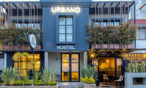 a building with a hostel in front of it at Urbano Luxury Hotel in Pasto