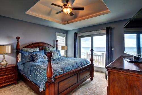 a bedroom with a bed and a ceiling fan at Magic Moments 999 in Avon