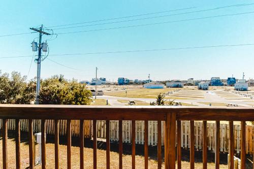 a view of a parking lot from a balcony at Oceanside Fun 952 RR in Rodanthe