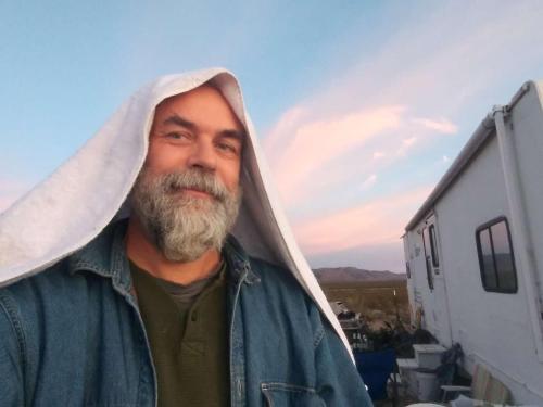 a man with a hood over his head at Camping at Desert Gardens Oasis in Lobo, TX in Van Horn