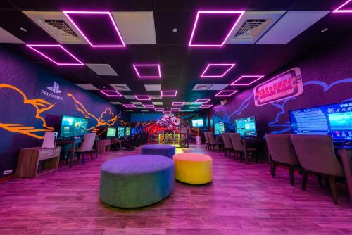 a gaming room with a bunch of slot machines at Grand Cosmos Resort Ruisui Hualien in Ruisui