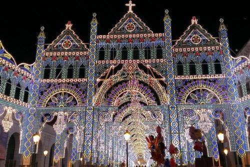 a large building covered in christmas lights at Welcome to Bari in Bari