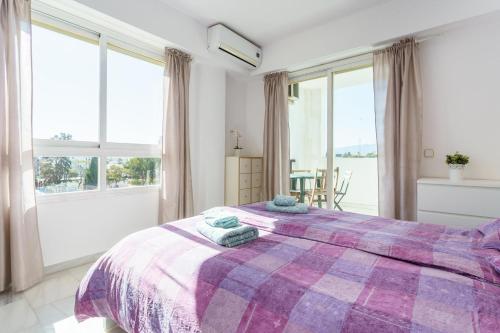 Postel nebo postele na pokoji v ubytování Apartamento Terrazas de la Veguilla