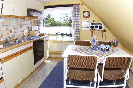 Kuchyň nebo kuchyňský kout v ubytování Ferienwohnung im Haus Riegstra