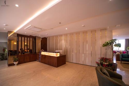 a lobby with a reception desk in a building at Aura Boutique Hotel in Udaipur