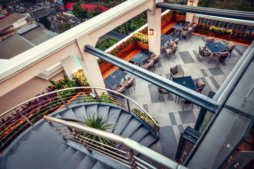 Ein Balkon oder eine Terrasse in der Unterkunft Maxx Phnom Penh Downtown By H World