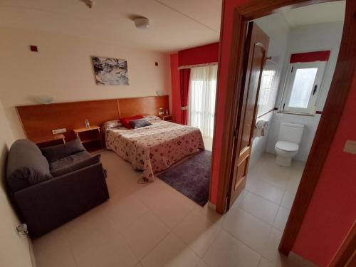 Ένα ή περισσότερα κρεβάτια σε δωμάτιο στο Hotel Valdoviño