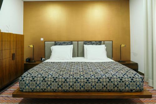 Säng eller sängar i ett rum på Casa Nova Agroturismo