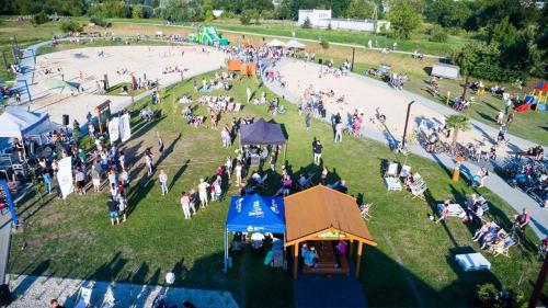 an aerial view of a crowd of people in a park at LUX Apartament Bedzin in Będzin