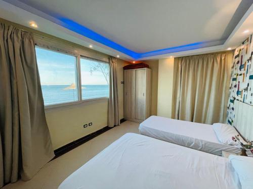 Kama o mga kama sa kuwarto sa Furnished Chalets for Rent in Cecilia Resort