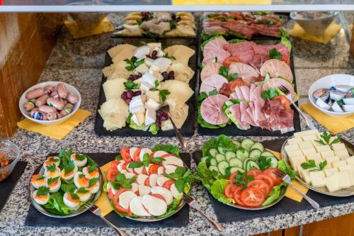 a bunch of different types of food on a table at Sax Imperial in Dresden
