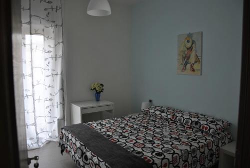 Ένα ή περισσότερα κρεβάτια σε δωμάτιο στο Casa Natia