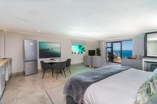 Кровать или кровати в номере Knysna, Pezula Golf Estate