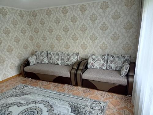 Ein Sitzbereich in der Unterkunft Апартаменты на Первомайская 37 "А"