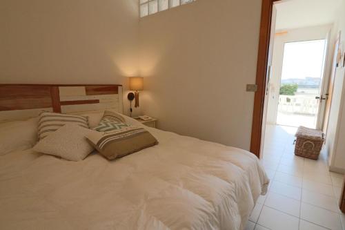 A bed or beds in a room at Casa Vacanza Benny Otranto
