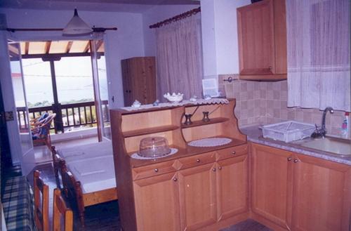 Kuchyň nebo kuchyňský kout v ubytování Dimitra's Apartment