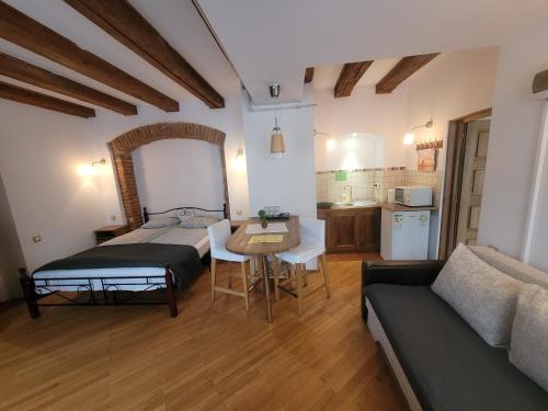 Katil atau katil-katil dalam bilik di Main Square Apartments & More