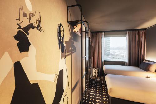 Postel nebo postele na pokoji v ubytování ibis Styles Arnhem Centre