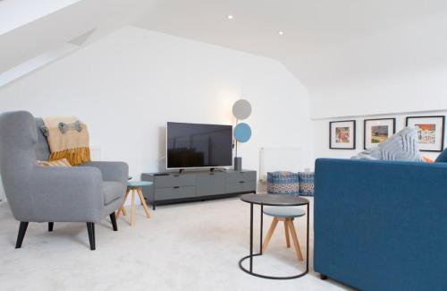 Et tv og/eller underholdning på Edinburgh Deluxe Duplex with Garage