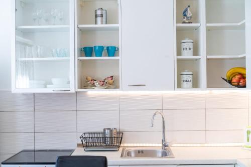 Kuhinja ili čajna kuhinja u objektu Marjan Apartment