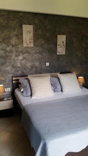Кровать или кровати в номере Villa Ikaros