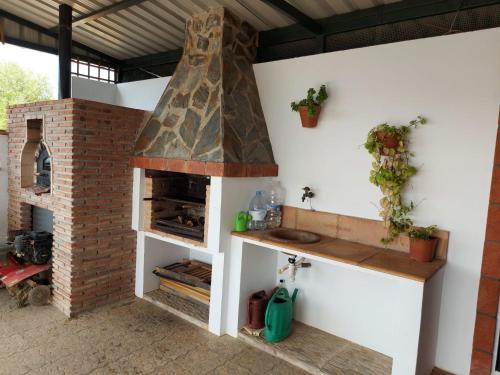 Photo de la galerie de l'établissement Andalusian farmhouse with barbecue, pool and wifi, à Malaga