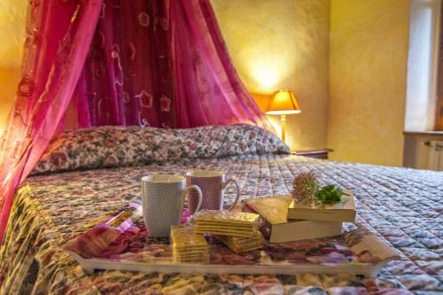 Ένα ή περισσότερα κρεβάτια σε δωμάτιο στο Agriturismo tranquillo e con vista panoramica