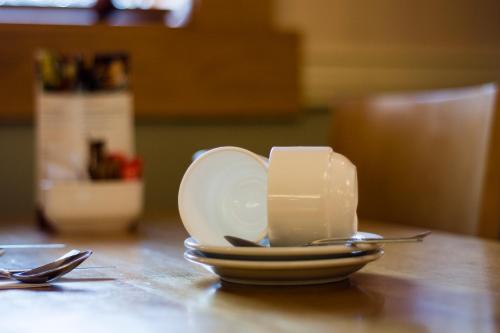 a candle sitting on top of a table at The Harbour Inn in Buncrana